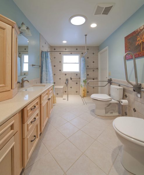 blue ridge virginia aging in place custom bathroom fold down grab bar curbless shower wheelchair accessible removable sink cabinet fronts roll under sink