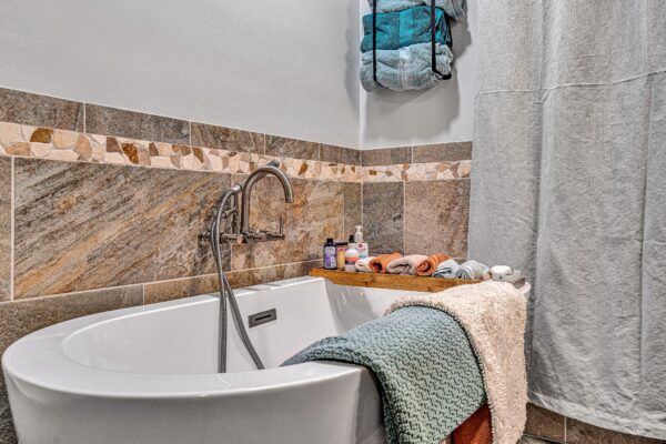 SAH Grant, Veteran, Aging-In-Place, Universal Design, Wheelchair Accessible, Barn Door, Curbless Tile Shower, Comfort Height Commode, Roll-under Vanity, Soaking Tub, Wet Room