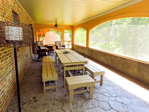 smith mountain lake virginia screen porch curved archway stone flooring