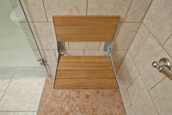 custom tile curbless shower wheelchair accessible wood fold down seat grab bars aging in place bathroom roanoke virginia