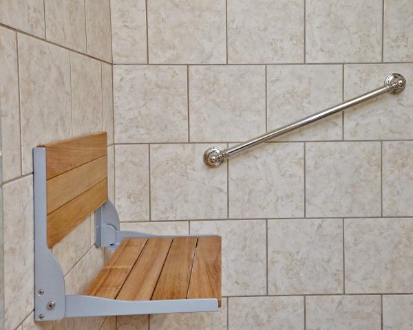 custom tile curbless shower wheelchair accessible wood fold down seat grab bars aging in place bathroom roanoke virginia